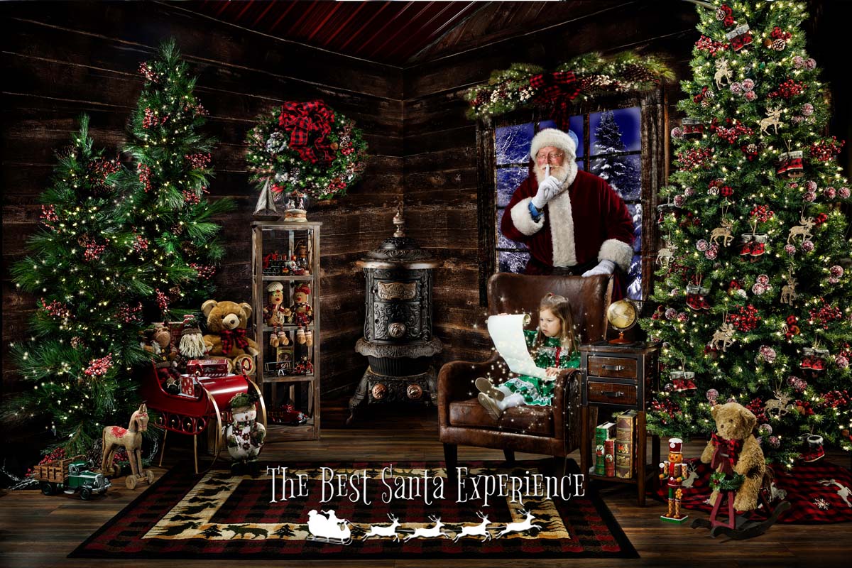 A cute little girl reads from Santa's Nice List while sitting in his chair inside Santa's Cabin!