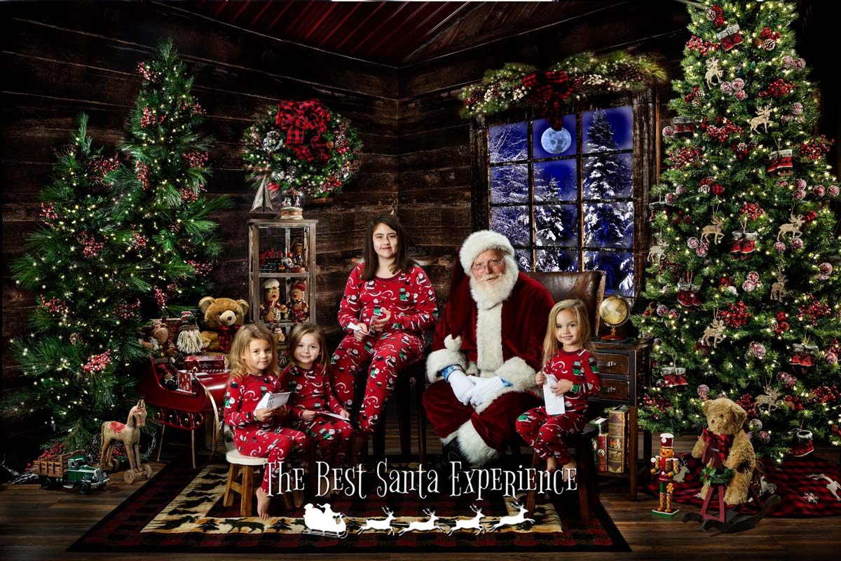 Four siblings share their wish lists with Santa in his cabin.