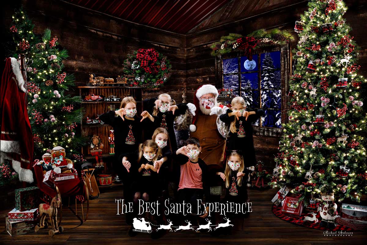Santa and seven cousins giving COVID a big "thumbs down"! This image was created during their private visit with Santa Claus at The Best Santa Experience.