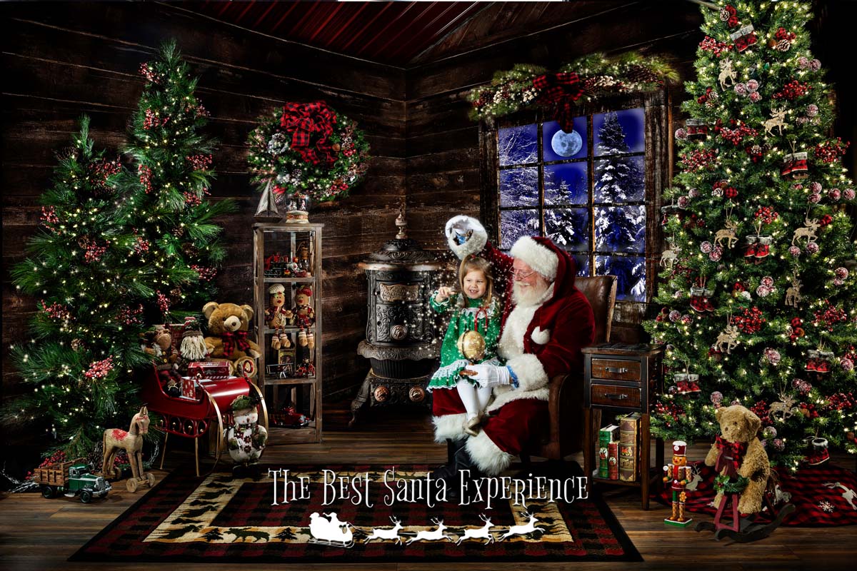 Santa and an adorable little girl sprinkle magic on Santa Magic Globe right there in Santa's Cabin!