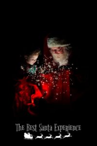 An adorable little girl takes a peek into Santa's Magic Toy Bag in Santa's Cabin!