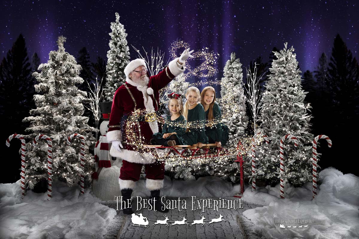 Three sisters take a ride on Santa's Magic Sled at The Best Santa Experience.